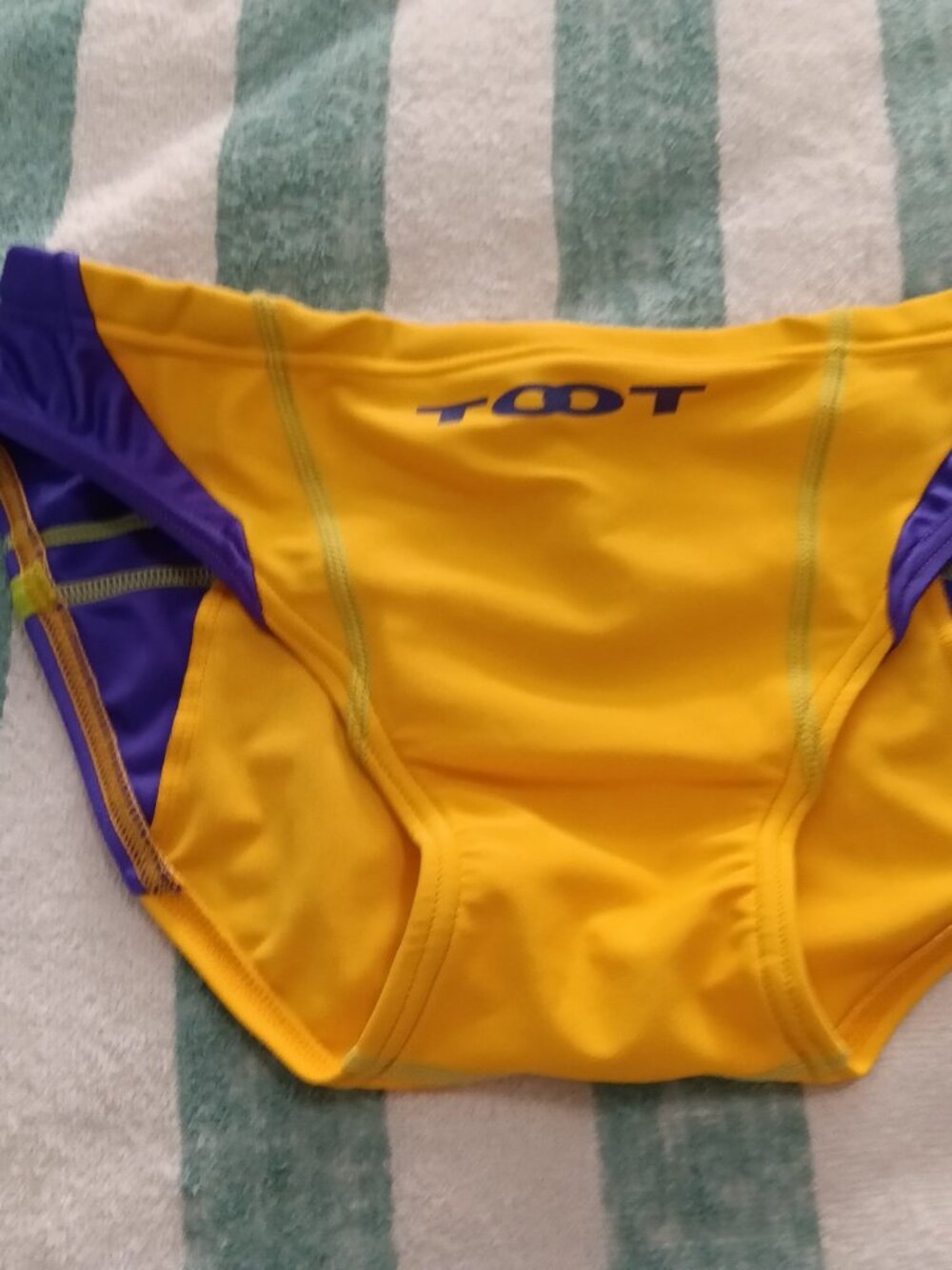 VINTAGE "TOOT" COMPETITIVE SWIM BRIEF, YELLOW w/ PURPLE SIDES, "M" - Pre-Owned